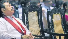  ?? AFP FILE ?? Musical chairs, Sri Lankan style: Mahinda Rajapakse at a ceremony in Colombo.