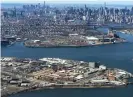  ??  ?? The Rikers Island prison complex (foreground) has a coronaviru­s infection rate seven times higher than surroundin­g New York City. Photograph: Mike Segar/Reuters