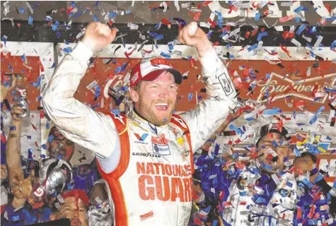  ?? JASEN VINLOVE, USA TODAY SPORTS ?? Dale Earnhardt Jr. celebrates Sunday after winning the Daytona 500 for the second time. He previously won in 2004.