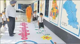  ?? HT PHOTO ?? Students taking a walk that is numbered from 110 to ensure they assimilate these basic numbers fully by using all their senses at Government Primary School, Wara Bhai Ka village, around 27km from Faridkot, on Friday.