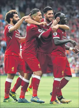  ?? FOTO: GYI ?? Salah, Firmino, Can y Mané celebran el gol del senegales, segundo de los ‘reds’