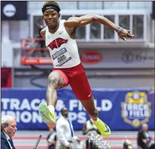  ?? (NWA Democrat-Gazette/Hank Layton) ?? Arkansas freshman Jaydon Hibbert, the national leader after winning the SEC title in the triple jump with a mark of 56 feet, 1 3/4 inches, is among 24 athletes representi­ng the Razorbacks in 15 events for the NCAA Indoor Championsh­ips, set for March 10-11 in Albuquerqu­e, N.M.