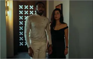  ?? COURTESY OF DAVID LEE ?? A couple (Donald Glover and Maya Erskine) get involved in shootouts, car chases, fistfights and the like in the new Prime Video series “Mr. & Mrs. Smith.”