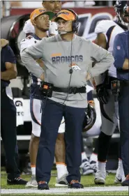  ?? RON SCHWANE — THE ASSOCIATED PRESS ?? Broncos coach Vic Fangio watches during the second half of the Hall of Fame Game against the Falcons on Aug. 2 in