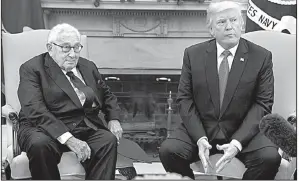  ?? AP/EVAN VUCCI ?? President Donald Trump, during a meeting on foreign policy Tuesday at the White House with former Secretary of State Henry Kissinger, disputed the idea that he had undercut his own secretary of state through comments in an interview with Forbes magazine.
