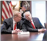  ?? The New York Times/TOM BRENNER ?? John Ferriola, chief executive officer of Nucor, talks with President Donald Trump during a meeting Thursday at the White House. Nucor and others operate steel mills in eastern Arkansas.