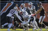 ?? STACY REVERE / GETTY IMAGES ?? Bears receiver Kevin White is snowed under by Patriots defenders on the New England 1-yard line on the final play of Sunday’s game.