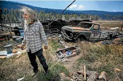  ?? AP ?? New Mexican Johnny Trujillo, 53, talks about battling the blaze that destroyed his sister’s home and his truck.