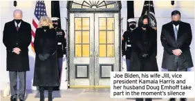  ??  ?? Joe Biden, his wife Jill, vice president Kamala Harris and her husband Doug Emhoff take part in the moment’s silence