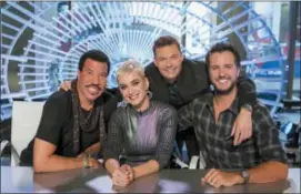  ?? ERIC LIEBOWITZ — ABC VIA AP ?? This image released by ABC shows, from left, Lionel Richie, Katy Perry, Ryan Seacrest and Luke Bryan in New York.