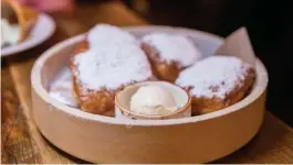  ?? J.Q. LOUISE / BOSTON HERALD ?? SWEET ENDING: Nothing says New Orleans like beignets, and Buttermilk and Bourbon is serving a special version in honor of Mardi Gras.