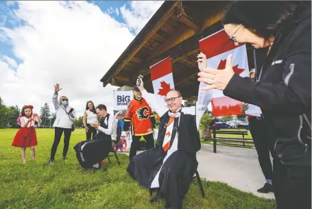  ?? AZIN GHAFFARI ?? Kristopher Perraton, and Transporta­tion Minister Ric Mciver had their moustaches shaved off by their families to raise funds for the Kids Cancer Care Foundation of Alberta on Wednesday. The foundation’s usual fundraisin­g activities have been side-swiped by the pandemic.