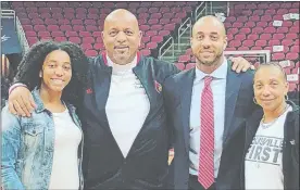  ?? PHOTO COURTESY OF EVANS FAMILY ?? R.J. Evans, the ex-NFA great who went on to play at Holy Cross and UConn, poses with his mother Deborah, right, sister Kastine, left, and father Ray.