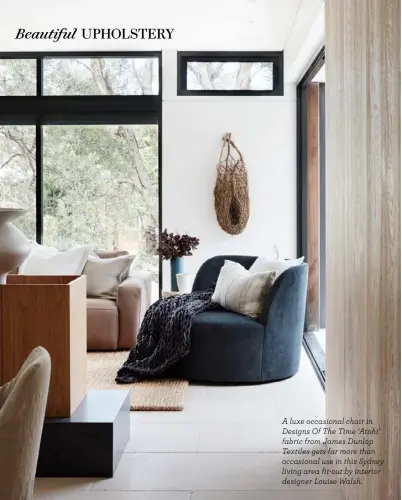  ?? ?? A luxe occasional chair in Designs Of The Time ‘Atohi’ fabric from James Dunlop Textiles gets far more than occasional use in this Sydney living area fit-out by interior designer Louise Walsh.