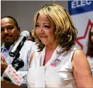  ?? JASON GETZ/SPECIAL TO THE AJC ?? Democrat Lucy McBath, speaking to backers Tuesday at her party at the Westin Atlanta Perimeter North, declared victory.