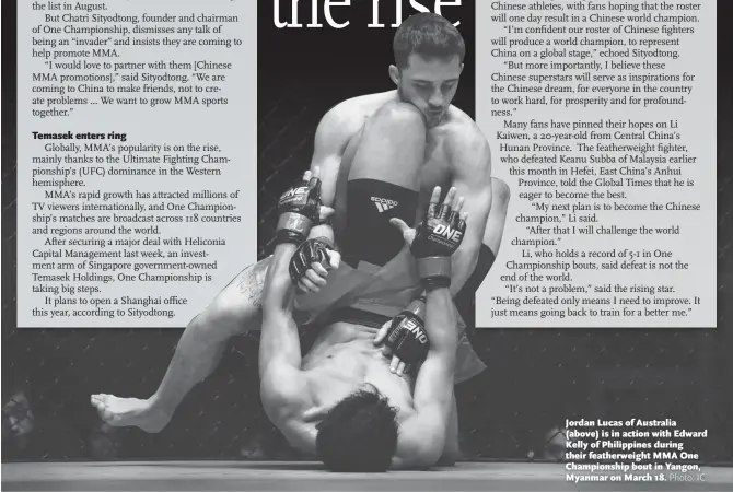  ?? Photo: IC ?? Jordan Lucas of Australia (above) is in action with Edward Kelly of Philippine­s during their featherwei­ght MMA One Championsh­ip bout in Yangon, Myanmar on March 18.