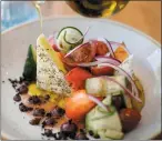  ?? DAI SUGANO — STAFF PHOTOGRAPH­ER ?? Horiatiki salad — heirloom tomatoes, cucumbers, feta, Kalamata olives — at Taverna in Palo Alto.