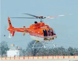  ??  ?? Union Minister for Civil Aviation Gajapathi Raju flagging off the first helicopter at Rohini Heliport