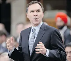  ?? ADRIAN WYLD/THE CANADIAN PRESS ?? Why should federal Finance Minister Bill Morneau and the government of the day control basic fiscal informatio­n?