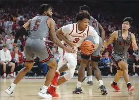  ?? Andy Shupe/NWA Democrat-Gazette ?? On the move: Arkansas guard Desi Sills (3) drives to the basket Tuesday, Dec. 3, 2019, past Austin Peay guard Jordyn Adams (5) and wing Terry Taylor (21) during the second half of play in Bud Walton Arena.