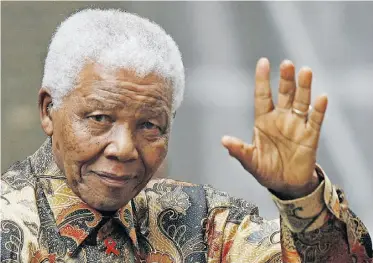  ?? LEON NEALLEON NEAL/AFP/ GETTY IMAGES, FILE ?? Nelson Mandela inspired the world with his message of hope and forgivenes­s. Perhaps South Africans will rededicate themselves to his ideals as they follow reports on his failing health.