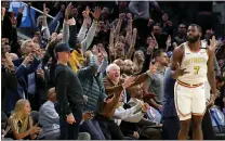  ?? RAY CHAVEZ — STAFF ARCHIVES ?? Fans celebrate at the Chase Center in San Francisco during a Jan. 16 Warriors-Nuggets NBA basketball game.