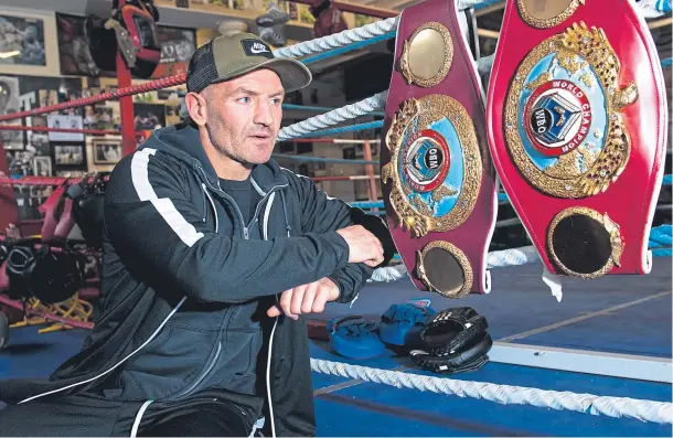 ??  ?? A REAL BELTER: Former two-time WBO featherwei­ght champion Scott Harrison at his Glasgow gym yesterday as he announced a boxing comeback