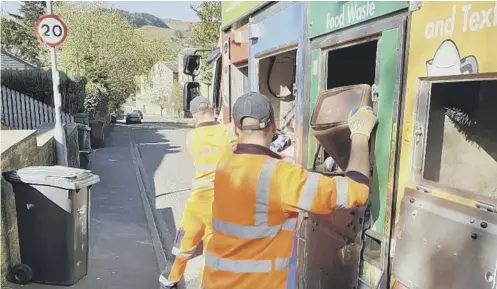  ??  ?? WASTE: Suez teams picking up recycling in Calderdale
