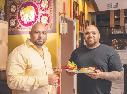  ?? ?? BUSINESS BROTHERS: Sunny Singh (left) and Harry Singh recently opened a new Indian restaurant, Toowoomba Masala Hut. Picture: Nev Madsen