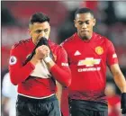  ??  ?? LEFT RED-FACED: Sanchez and Martial