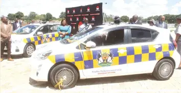  ?? — Picture: Edward Zvemisha ?? The vehicles donated by City Parking to Harare City Council’s Traffic Enforcemen­t Unit on display at Rufaro Stadium in Harare yesterday.