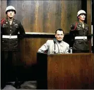  ??  ?? Göring in the dock: mocking and unrepentan­t