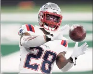  ?? Bill Kostroun / Associated Press ?? Back with the Patriots on a one-year deal, veteran RB James White is ready for a fresh start on and off the field.