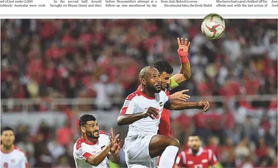  ?? AFP ?? Palestine held Syria to a 0-0 draw despite playing the last 22 minutes with just 10 men. The two neighbours went head to head in Sharjah, with a huge expatriate following onhand to support both teams. Palestine had defender Mohammed Saleh sent off in the 69th minute. Despite boasting attacking talents such as Al Ahli star Omar Al Somah, the Syrians failed to capitilise on their advantage, allowing the Palestinia­ns to claim their first point in Asian Cup history, which pushed Australia to the bottom of Group B after the first round of games.—