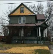  ?? RICHARD PAYERCHIN — THE MORNING JOURNAL ?? Lorain Ward 2 Councilman Dennis Flores, his mother and their home at 212 W. 18th St. have become involved in a case on Lorain Municipal Court’s housing docket. Flores said he supports more building code enforcemen­t in Lorain, but the city also should be sympatheti­c to senior citizens and those who cannot afford expensive home repairs.