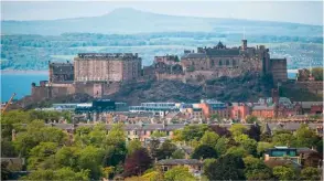  ??  ?? CAPITAL FORTRESS From up on Braid Hill, Edinburgh Castle on its volcanic plinth dominates the skyline, while the hills of Fife shade the far horizon.