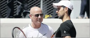  ?? PICTURE: EPA ?? DREAM TEAM: Novak Djokovic, right, with new coach Andre Agassi.