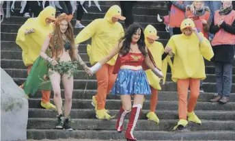  ??  ?? Lauren ‘Poison Ivy’ Flaxen and Nesika ‘Wonder Women’ Stirling lead the parade.