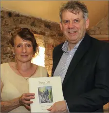  ??  ?? Bernadette Morrison-Martin with her book Footfall in the Market House, Dunleer, which was officially launched by Michael O Dowd.