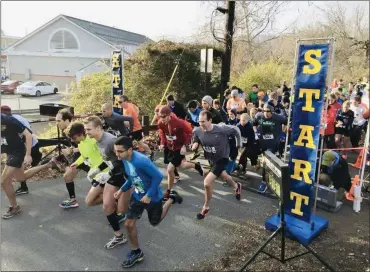  ?? PHOTO COURTESY OF BERKS GYMNASTICS FLIPPIN’ FUN 5K TURKEY RUN ?? Participan­ts at the start of a past Flippin’ Fun 5K Turkey Run in Wyomissing, Berks County.