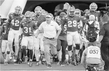  ?? STEPHEN M. DOWELL/ORLANDO SENTINEL ?? UF head coach Dan Mullen and the Gators are headed to the Orange Bowl vs. Virginia on Dec. 30 in Hard Rock Stadium.