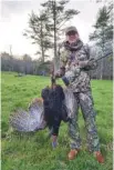  ?? PHOTO CONTRIBUTE­D BY LARRY CASE ?? Caleb Kushner from Washington, D.C., shows off the gobbler he took while turkey hunting with Potts Creek Outfitters out of Paint Bank, Va.