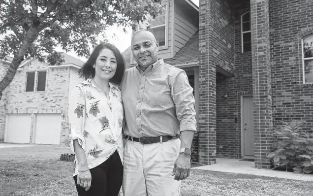  ?? Jerry Lara / Staff photograph­er ?? Rosalinda and Rigoberto Montero contracted to build their dream home, but the deal was terminated after they declined to pay about $50,000 to cover new costs.
