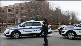  ?? NANCY LANE — BOSTON HERALD ?? Boston Police surround East Boston High after hoax threats hit Monday. Boston was not alone in the “Swatting” calls.