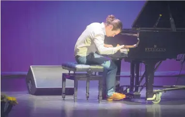  ?? MARLA BROSE/JOURNAL ?? Ki Cooley-Winters, 16, plays Dizzy Gillespie’s “A Night in Tunisia” during the Inaugural John Lewis Youth Jazz Piano Competitio­n on Wednesday.