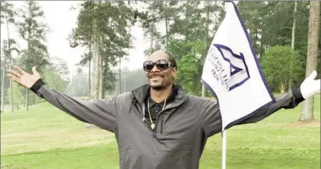  ?? (Reuters photo) ?? Rapper Snoop Dogg reacts after taking a few practice swings at a golf course in Augusta, Georgia, US, April 5, 2017.