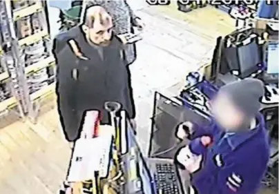  ??  ?? MURDER ACCUSED: Stefano Brizzi purchases items at the Leyland Store in Southwark Street, London