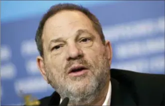  ?? MICHAEL SOHN — THE ASSOCIATED PRESS FILE ?? In this file photo Harvey Weinstein speaks during a press conference for the film “Woman in Gold” at the 2015 Berlinale Film Festival in Berlin.