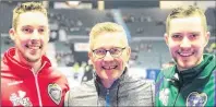  ?? SUBMITTED ?? Charlottet­own’s Peter Gallant, centre, stand with his sons Brett, left, and Chris, right, at the recent Tim Hortons Brier in Regina, Sask. Chris was second stone for for Team P.E.I., while Brett was second for Team Canada, skipped by Brad Gushue, which...