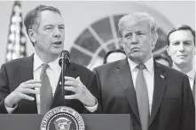  ?? Jim Watson / Getty Images ?? The office of U.S. Trade Representa­tive Robert Lighthizer, shown with President Donald Trump in September, confirmed that the Chinese vice premier and U.S. envoys spoke by phone.